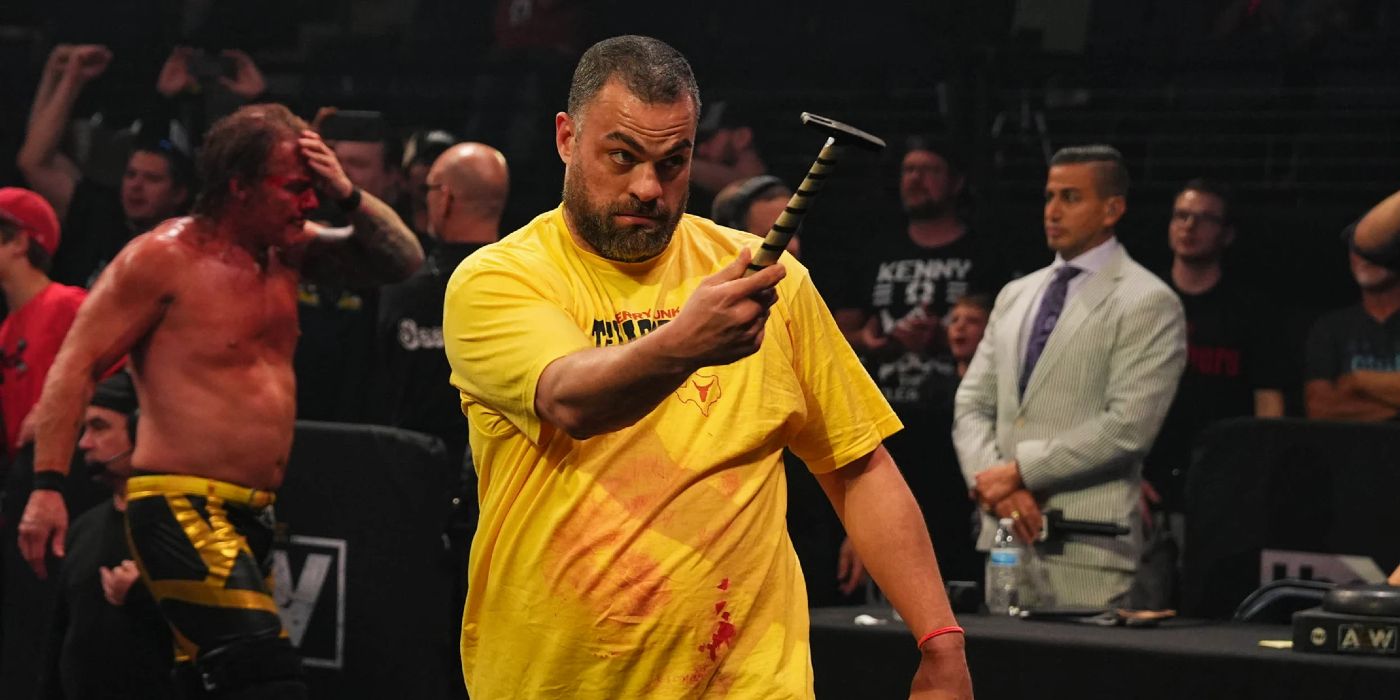 Eddie Kingston offers the ring bell as a weapon during an episode of AEW Dynamite.