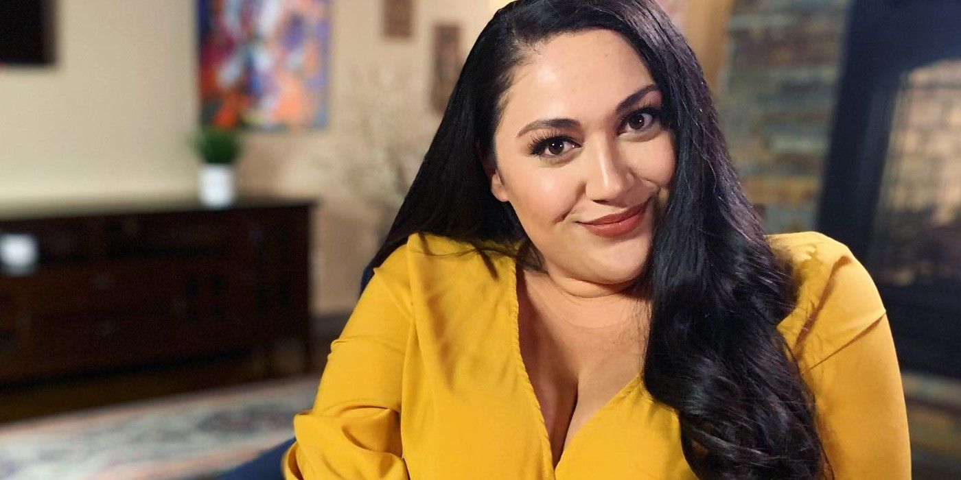 Kalani Faagata wearing a yellow dress smiling 90 Day Fiance 90DF