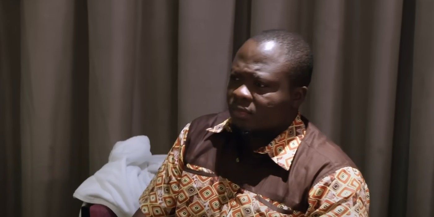 michael ilesanmi 90 day fiance brown shirt in Nigeria CROPPED