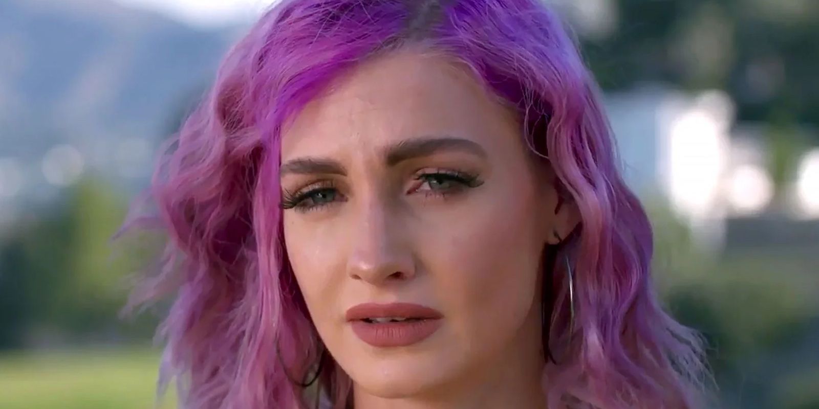 Welcome to Plathville's Moriah Plath looking sad with purple hair and lipstick