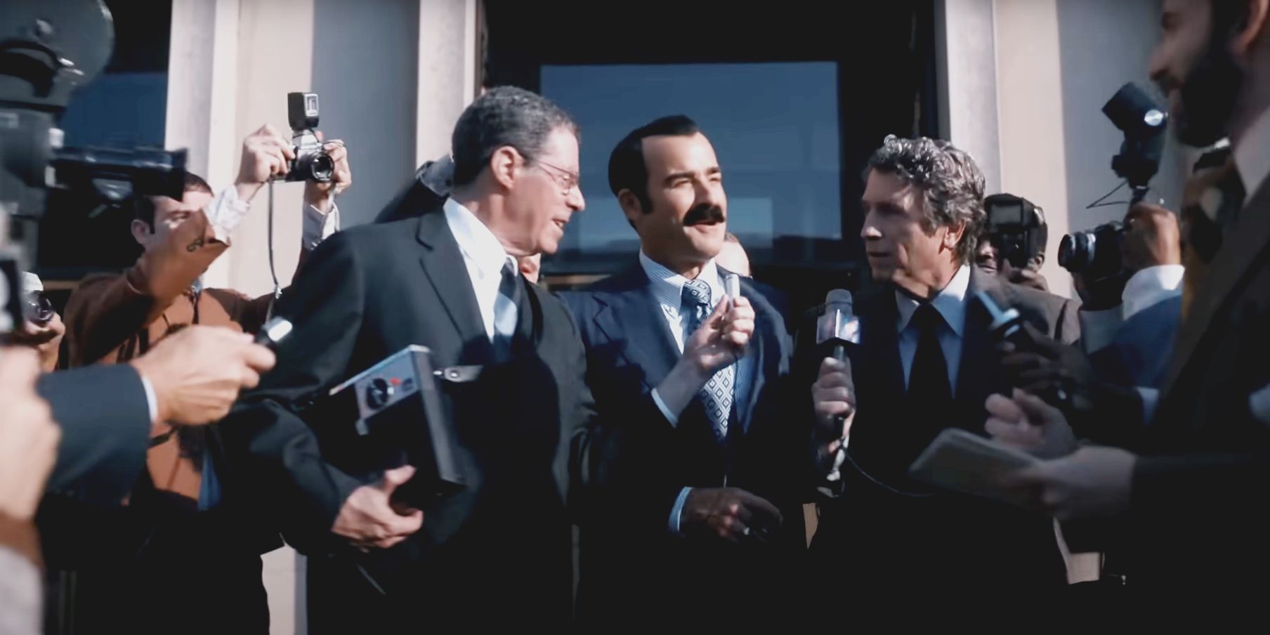 Justin Theroux as G Gordon Liddy speaking with reporters in White House Plumbers