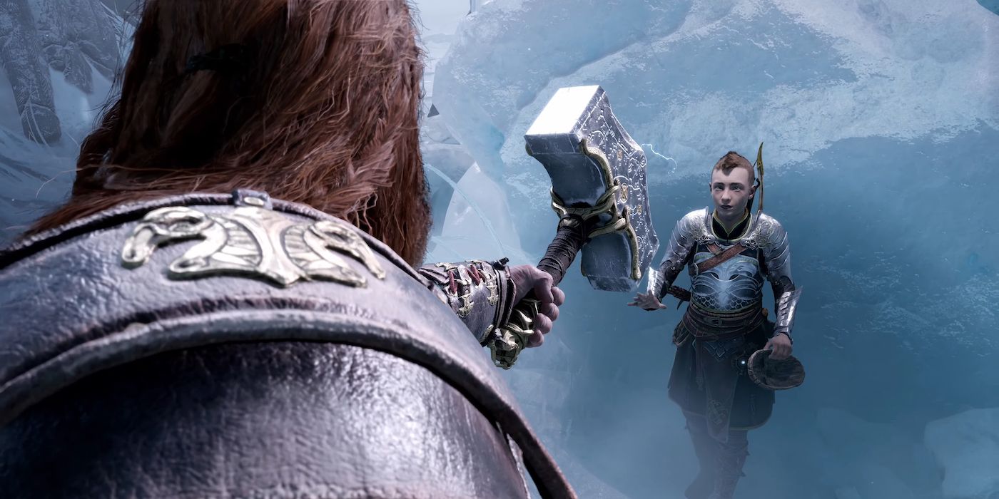 Thor threatening Atreus with Mjolnir in Niflheim in God of War Ragnarok