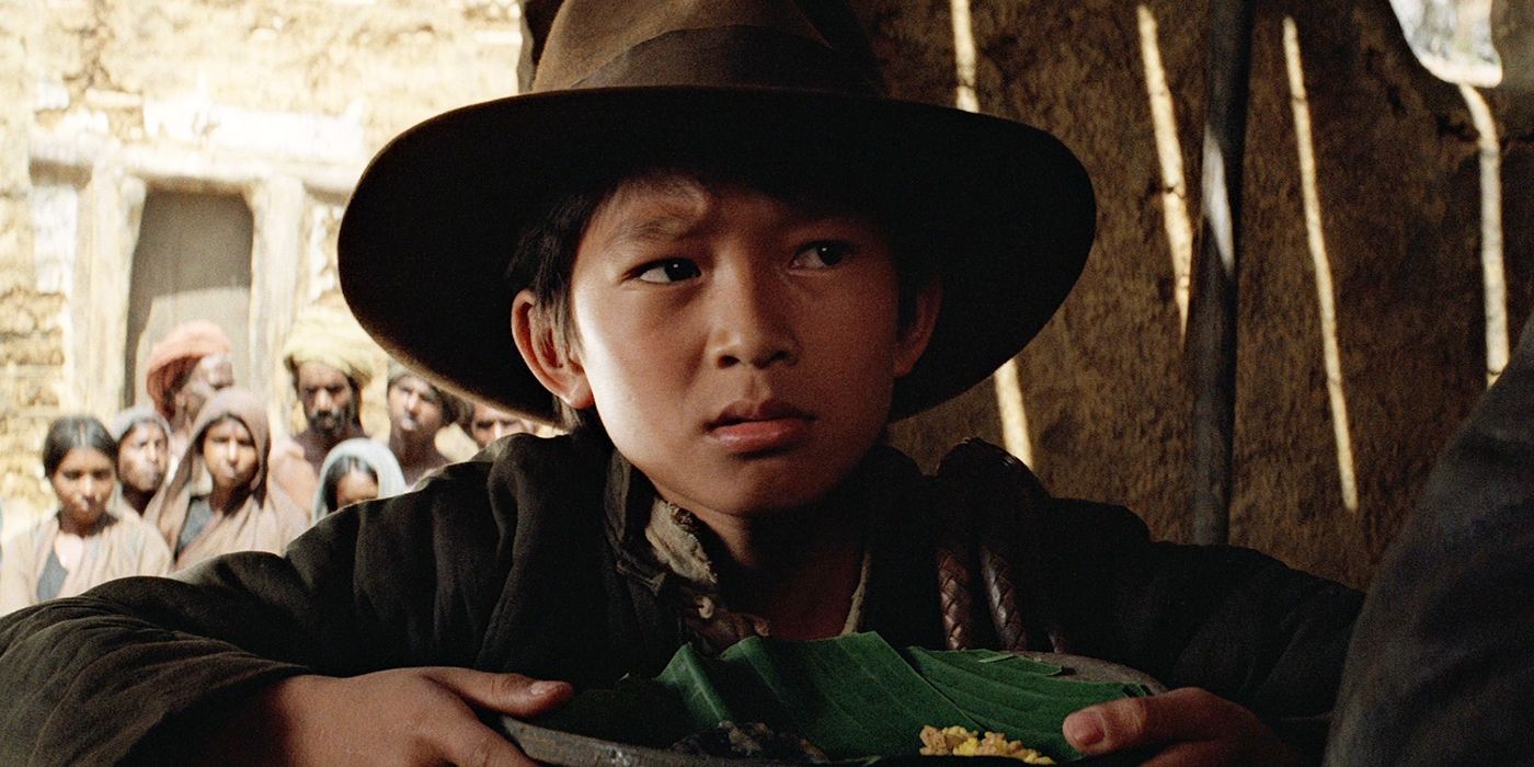 Short Round wearing Indiana Jones' hat in Temple of Doom
