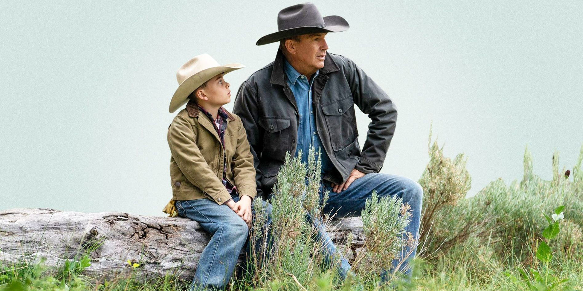 Tate looking up at John in Yellowstone
