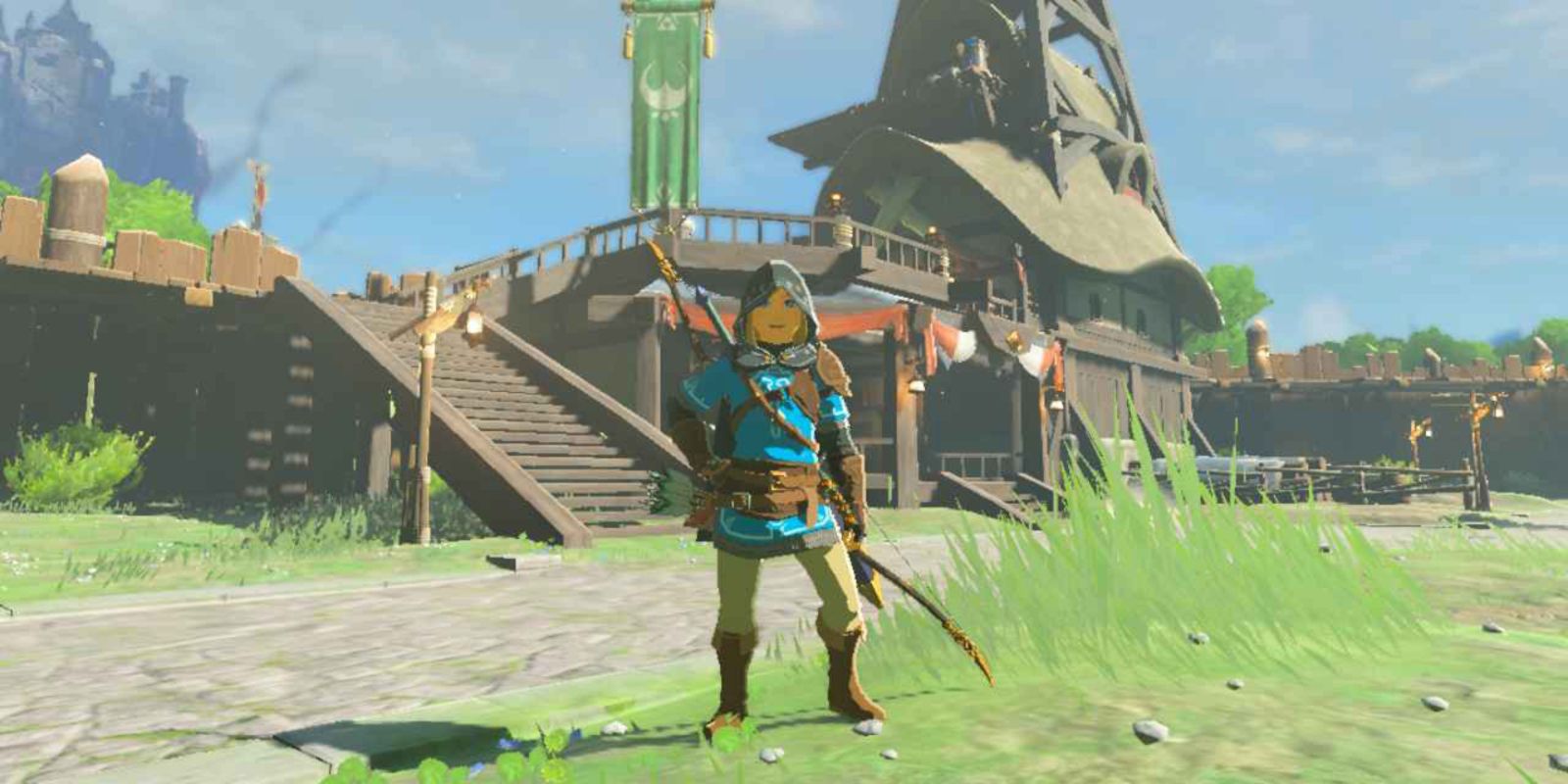 The Legend Of Zelda Tears Of The Kingdom Link Standing And Smiling In Lookout Landing Wearing Champion's Leathers