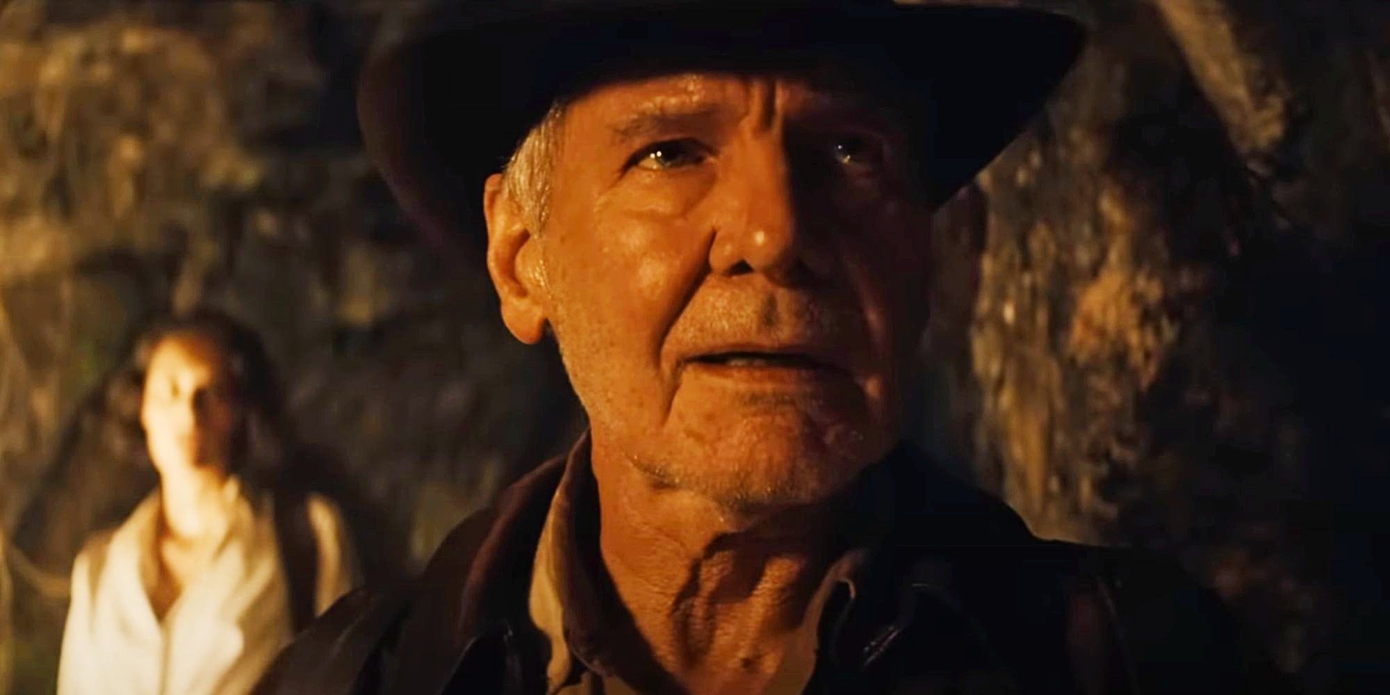 Harrison Ford as Indiana Jones with Helena in the background in Indiana Jones and the Dial of Destiny