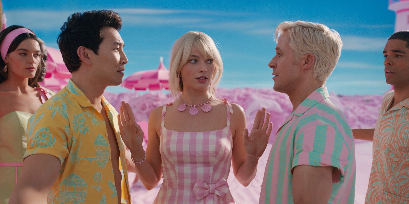 Barbie getting between two Kens in the Barbie movie