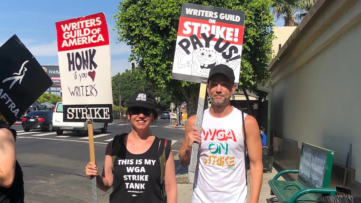 Cat Vasko and fellow WGA member on strike outside of Paramount Studios