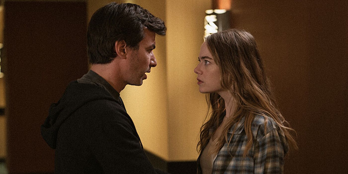Nathan Fielder as Asher and Emma Stone as Whitney staring at each other in The Curse