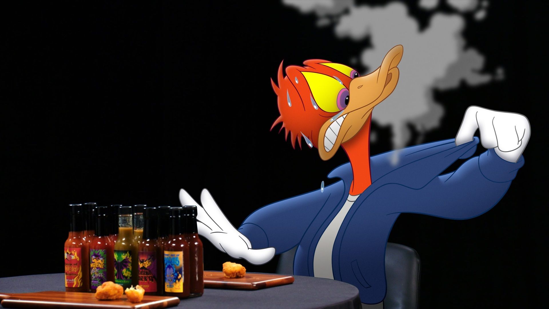 Donald Duck essaie de garder son sang-froid en mangeant des ailes épicées