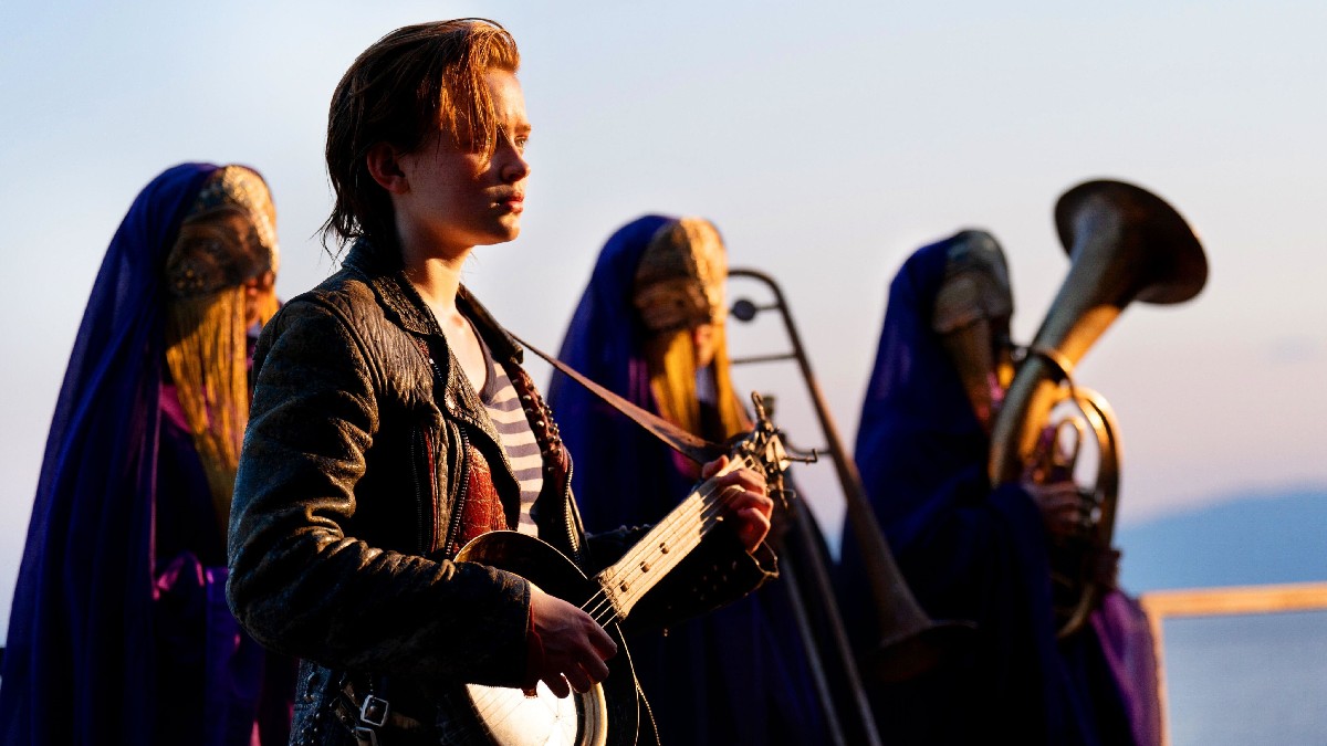 Revue 'O'Dessa': Sadie Sink Rocks and Rules in Post-apocalyptic Busking Fable